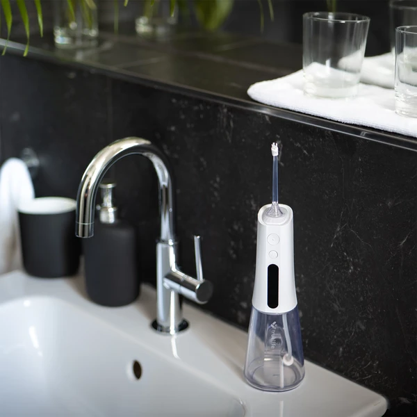 TrueLife AquaFloss Compact L100 ústní sprcha bílá - Ústní sprchy - Obrázek 74755bdd1afe42b991a14f9342f8b7f1