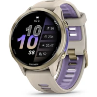 Garmin Forerunner 970 zlaté/zlatá titanová lunet s béžovo-indigovým poloprůhledným řemínkem - Chytré hodinky